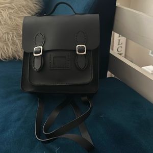 Hand made black leather backpack purse.